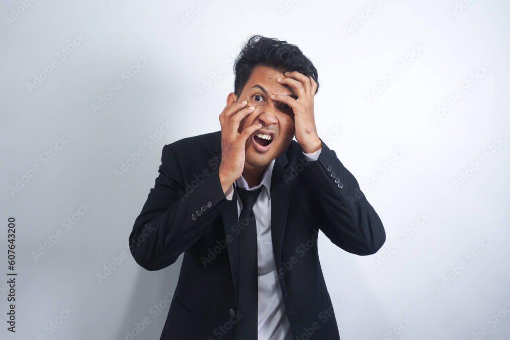 Depressed Business man having an headache on white Depressed Business man having an headache on white