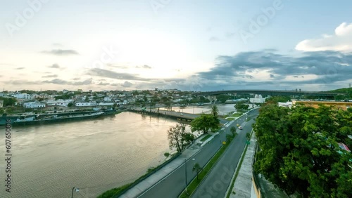 Wallpaper Mural Cars travel Avenida Malecon, along Rio Ozama, in Santo Domingo as sunsets over tropical island Dominican Republic - Timelapse Torontodigital.ca