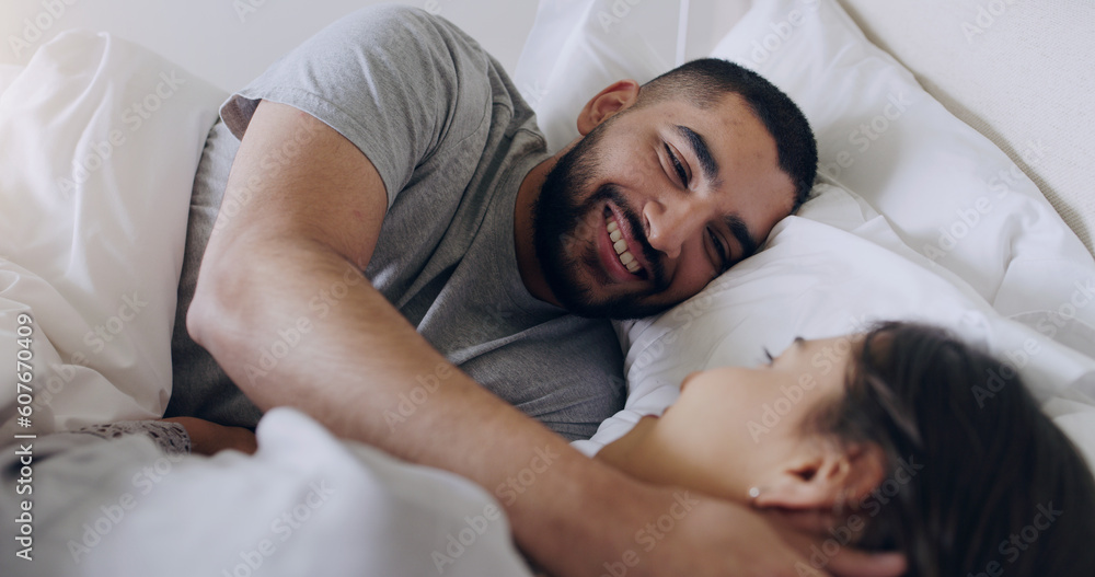 Face, happy man and relax with woman in bed, room and enjoy romance of quality time together at home. Couple, relationship and bonding in morning for love, care and happiness for partner on honeymoon