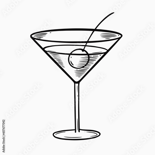 Martini cocktail in glass with olive.