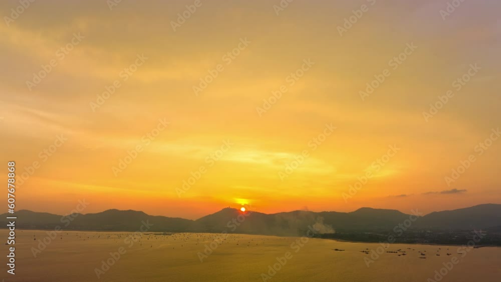 .aerial hyperlapse view amazing colorful cloud in bright sky of sunset above the ocean. .landscape amazing light of nature cloudscape bright sky above Phuket sea.. color texture sky background. .aerial hyperlapse view amazing colorful cloud in bright sky of sunset above the ocean. .landscape amazing light of nature cloudscape bright sky above Phuket sea.. color texture sky background.