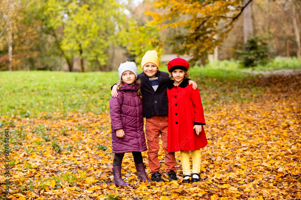 Group of friends play in autumn park Group of friends play in autumn park