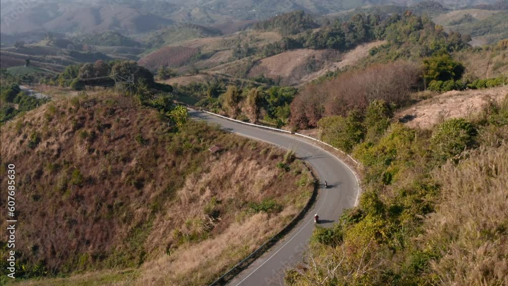 Unveiling Shot Of Bikers Riding Motorcycles On Rural road, NW Thailand Misc, Thailand Unveiling Shot Of Bikers Riding Motorcycles On Rural road, NW Thailand Misc, Thailand