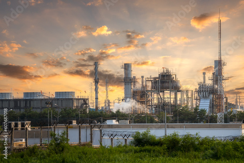 Refineries and Petrochemicals Petrochemical plant, industrial architecture with sky background at sunset. oil refinery from industrial energy and petroleum energy business fields © jutawat