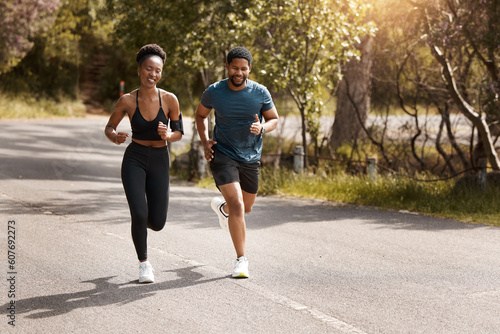 Health, exercise and black couple running, nature and workout goal with endurance, training and wellness. Runners, man and woman in the street, run and progress with health, performance and fitness photo