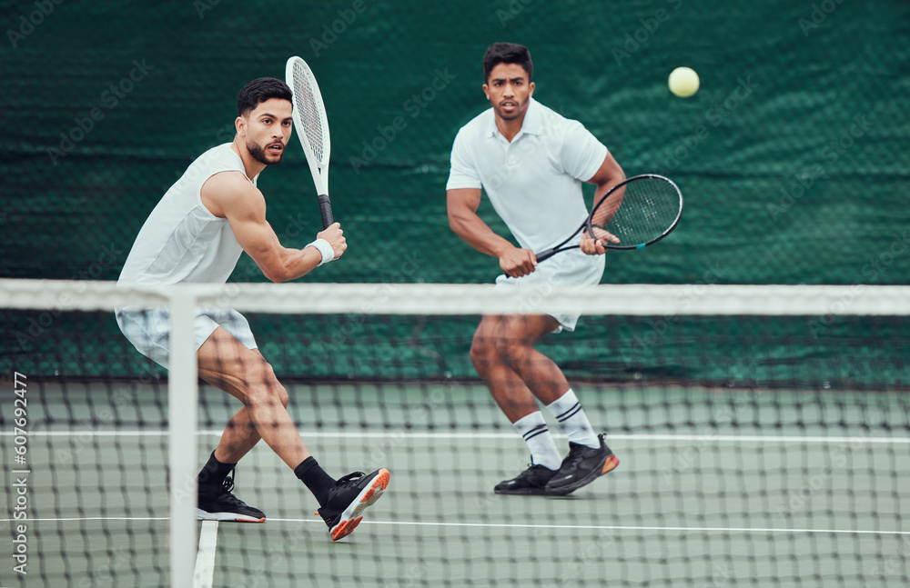 Male team, ball and tennis court during a competition in india for fitness, health and sport. Man, athlete and together with action for game with training and a challenge for wellness in the outdoor.