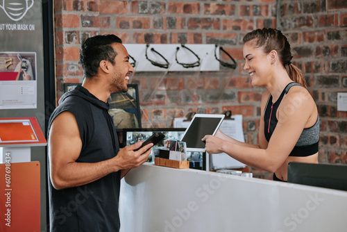 Photos Talking, tablet fitness and an Asian man with a woman for a gym membership and health app