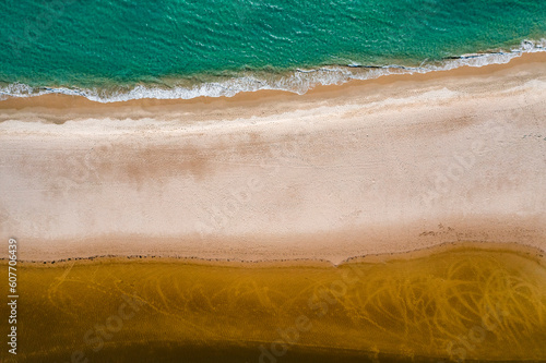 Aerial view of Playa Valdevaqueros, a small beach along the Mediterranean Sea coastline, Tarifa, Cadiz, Spain. photo