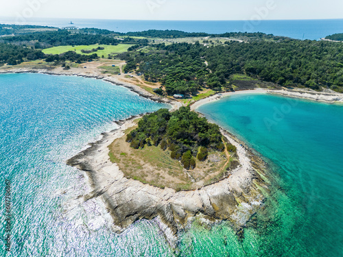 Aerial view of a small peninsular off the coast of Kamenjak in Istria, Croatia. photo