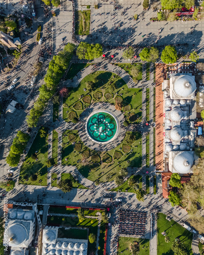 Aerial view of many people celebrating the muslim day at the end of the Ramadan in Sultan Ahmet Park, Sultanahmet district of Istanbul, Turkey. photo