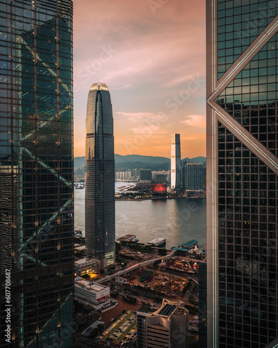 Aerial View of the Tower and financial district with skyscrapers at sunset along the waterfront bay in Hong Kong Island downtown, Central and Western District, Hong Kong, China. photo