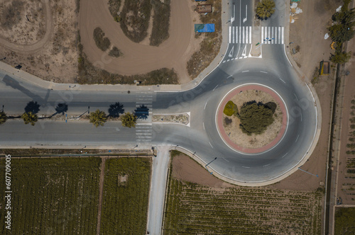 Aerial view of a roundabout close to an agricultural fields, Alboraia, Valencia, Spain. photo