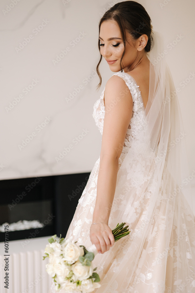 Portrait of gorgeous bride with beautiful wedding bouquet. Morning of bride. Wedding day. Portrait of gorgeous bride with beautiful wedding bouquet. Morning of bride. Wedding day.