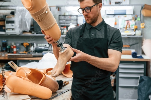 Εκτύπωση καμβά Technician working with prosthesis in modern laboratory