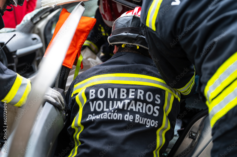 Car Crash Traffic Accident. Firefighters Rescue Injured Trapped Victims. Firemen give First Aid to passengers. High quality photography. Car Crash Traffic Accident. Firefighters Rescue Injured Trapped Victims. Firemen give First Aid to passengers. High quality photography.