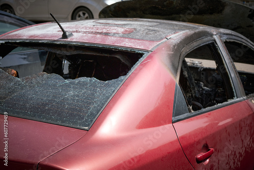 Canvas Print Close-up of a burnt car body.