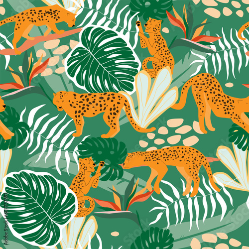 Seamless pattern with leopards in the jungle with palm trees and flowers. Predatory cats on a natural tropical print. Vector graphics.