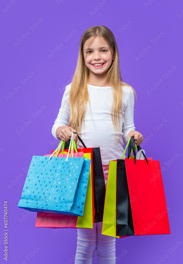 photo of positive teen girl with shopping purchase. teen girl with shopping purchase photo of positive teen girl with shopping purchase. teen girl with shopping purchase