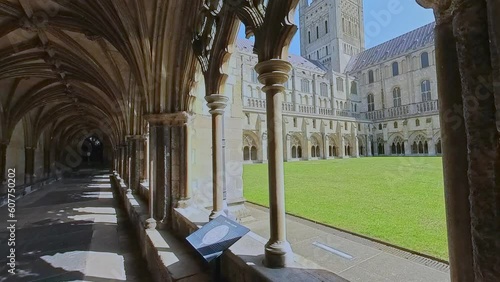 The cloisters and internal grass courtyard at the majestic cathedral in the city of Norwich. Captured on a bright and sunny morning