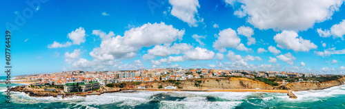 Beautiful oceanscape panorama with skyline, ocean rocky coastline. Drone view over beaches, coastlines in Ericeira, Portugal, on summer sunny day. Aerial view to the Beautiful European touristic town.