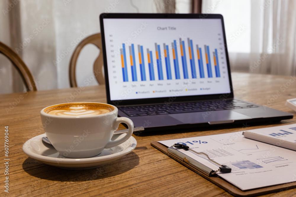 Start your working day with hot latte coffee cup background, laptop and mobile phone at work. Start your working day with hot latte coffee cup background, laptop and mobile phone at work.