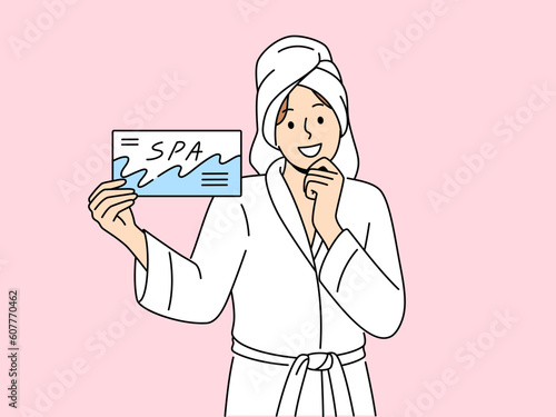Smiling woman in bathrobe and towel on head holding spa center certificate. Happy female use beauty salon voucher for skincare procedures. Vector illustration. 