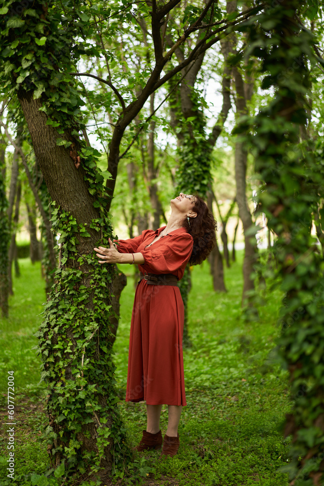 Candid of a mature curly hair redhead woman