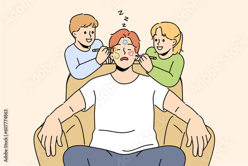 Happy children have fun drawing on father sleeping on chair at home. Naughty smiling kids paint on sleepy dad face, relaxing in armchair. Vector illustration. 