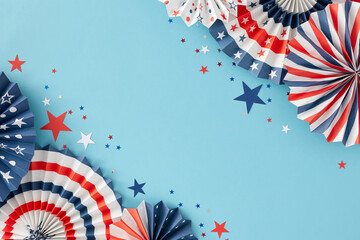 Idea for patriotic celebrations on Independence Day in America. Top view flat lay of national folding paper fans, blue, red, white stars on light blue background with empty space for text or advert