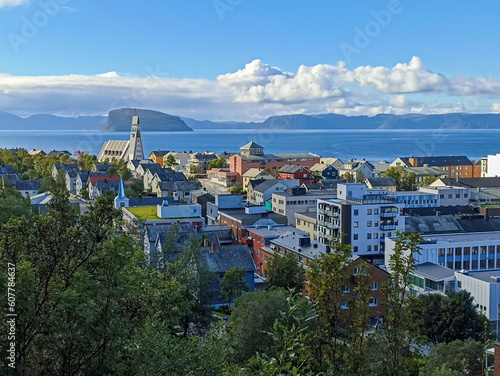The view of Hammerfest town with Hammerfest church, surrounded by sea, mountains, and islands, Finnmark, Norway photo