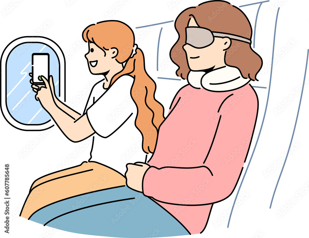 Smiling girl make clouds picture from plane window Smiling girl make clouds picture from plane window