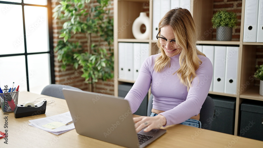 Young beautiful hispanic woman business worker using laptop working at office Young beautiful hispanic woman business worker using laptop working at office
