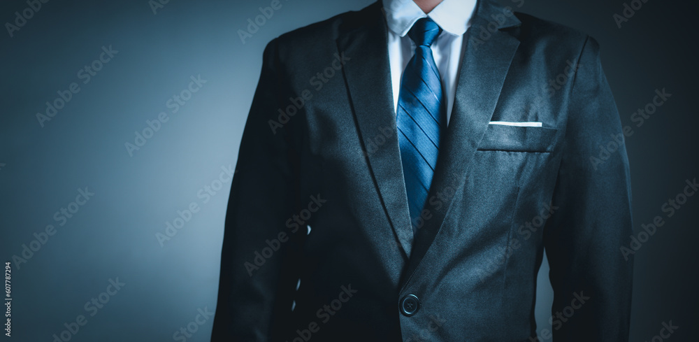 businessman standing on dark gradient background. business concept. suit. businessman standing on dark gradient background. business concept. suit.