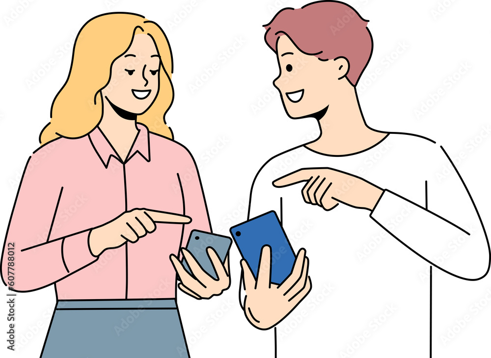 Fototapeta premium Smiling couple browse internet on cellphones