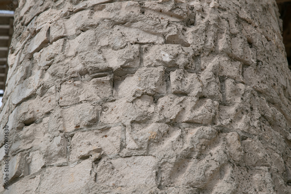 Concrete texture for the background. Ancient brick columns. Abstract brick pattern on a concrete surface as a background. Structure of an old destroyed wall for vintage style. Concrete texture for the background. Ancient brick columns. Abstract brick pattern on a concrete surface as a background. Structure of an old destroyed wall for vintage style.