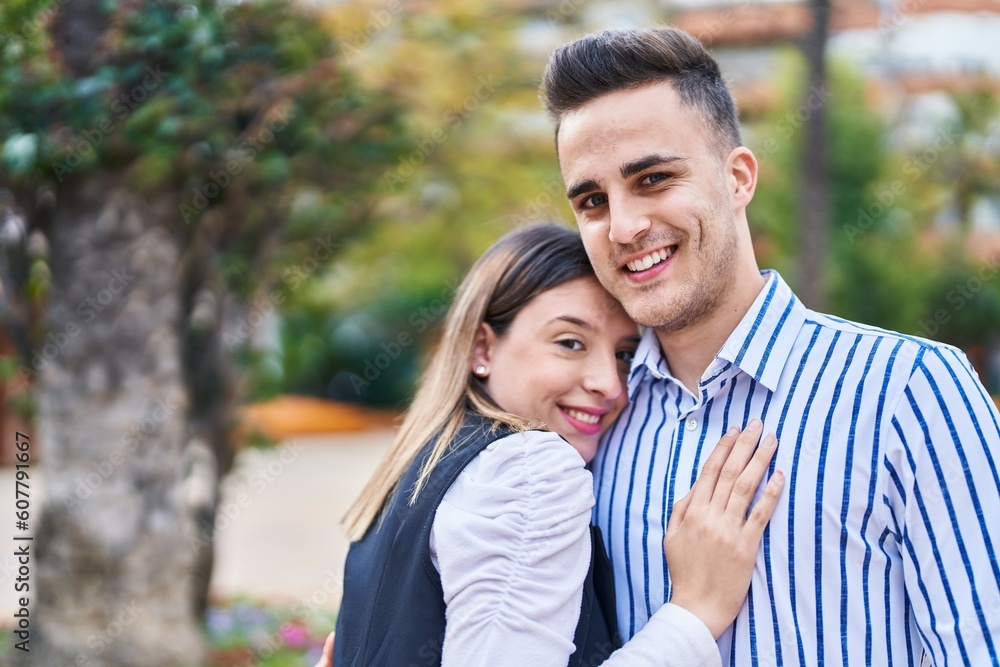 Man and woman couple smiling confident hugging each other at park Man and woman couple smiling confident hugging each other at park