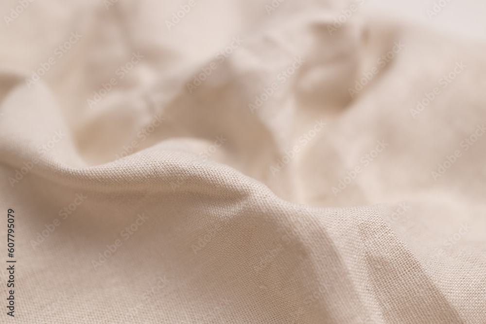 Natural linen fabric texture. Rough crumpled burlap background. Selective focus Natural linen fabric texture. Rough crumpled burlap background. Selective focus