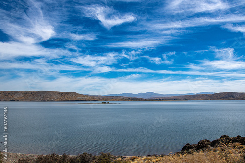 Embalse Piedra de ?guila, a majestic reservoir in Argentina, impresses with its vast expanse of water and the rugged beauty of its surroundings photo