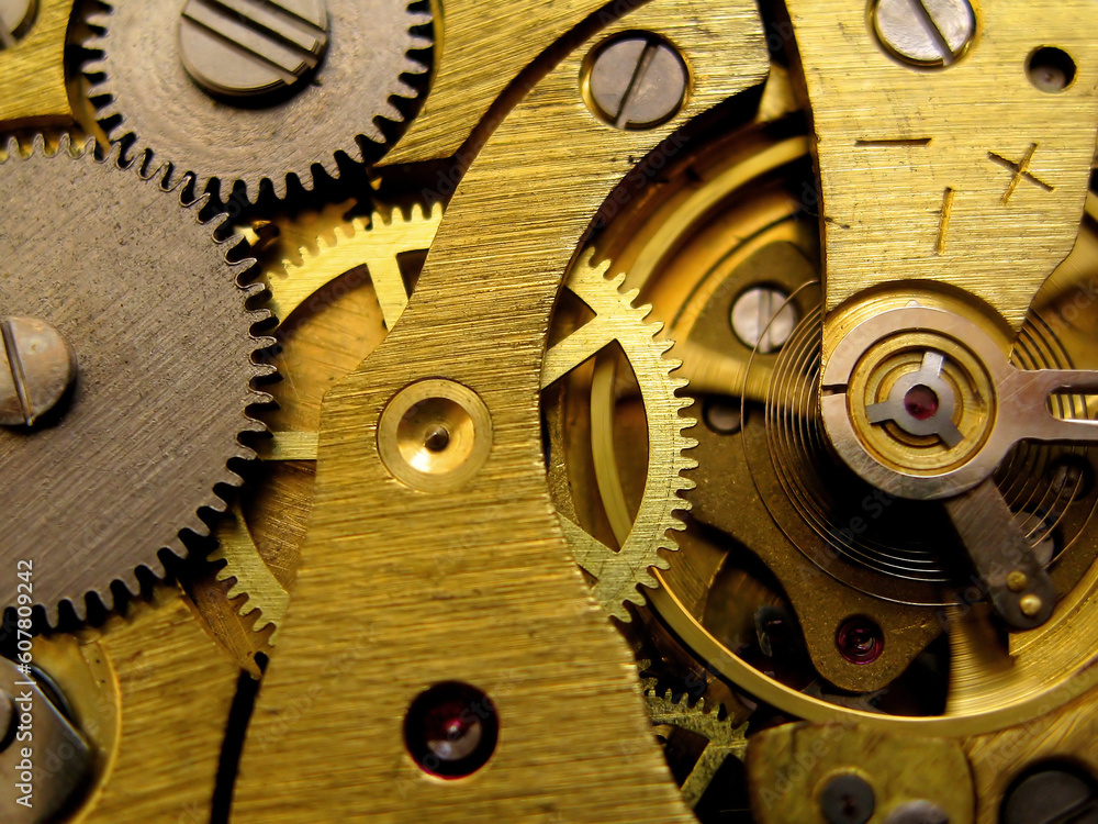 A macro photo of a pocket watch mechanism