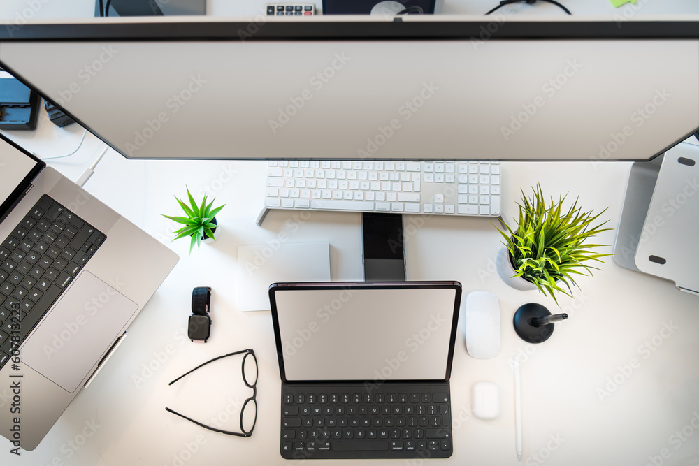 Top view of a work desk. Devices screens mockup. Graphic design home ...