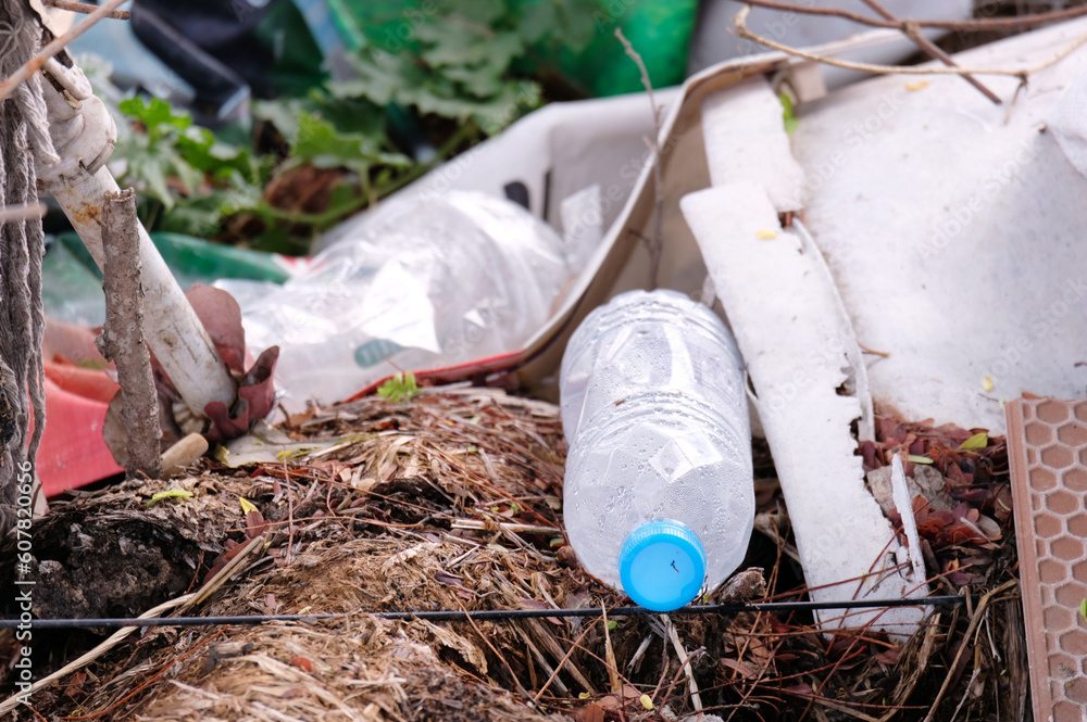 Obraz premium Waste of plastic water bottles on the floor.