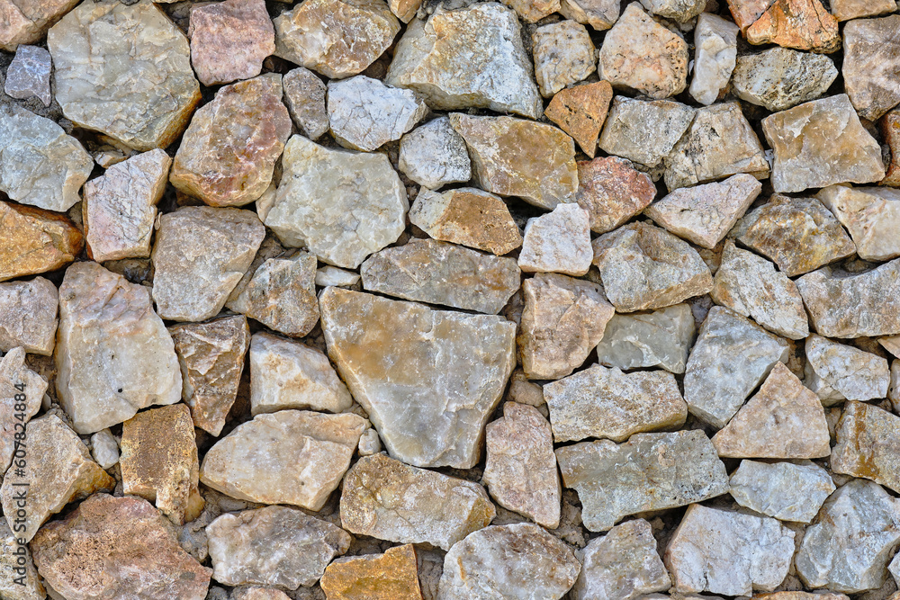 Fototapeta premium Granite stone wall, pattern of natural gray granite stone wall for background.