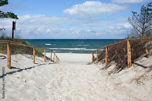 Fototapeta Naklejka Na Ścianę i Meble -  entrance to the wide beach in Stilo with the white sand, Baltic sea, Poland
