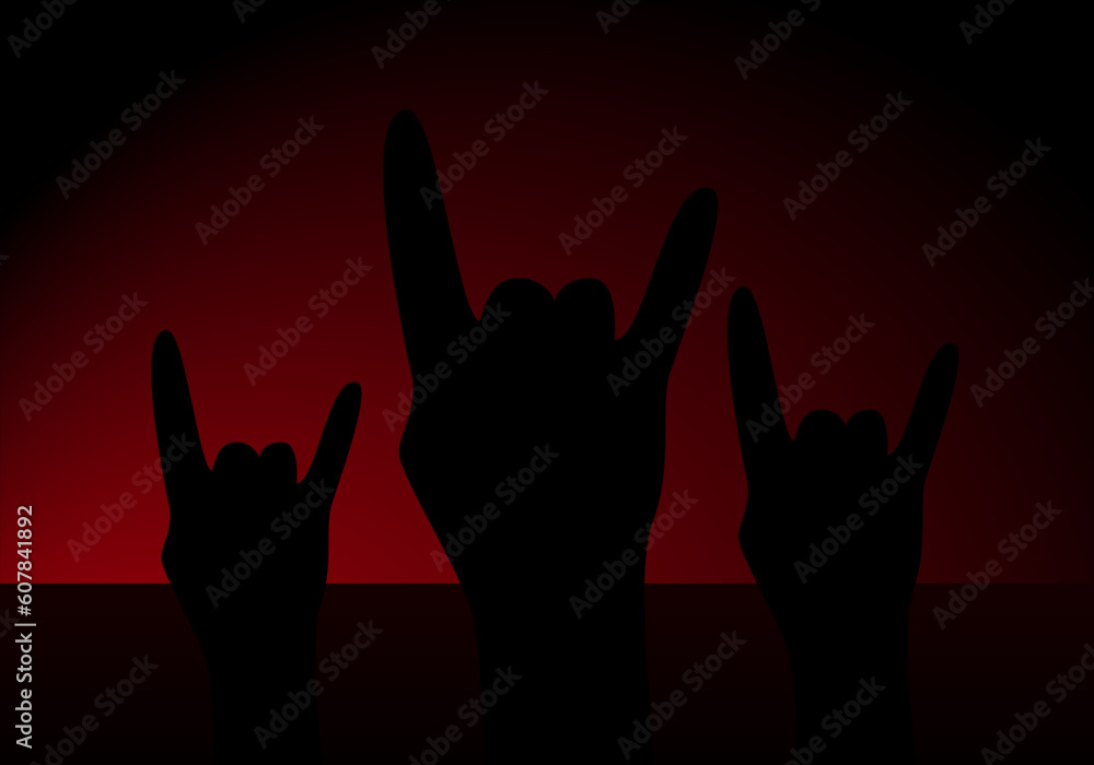  Concierto de rock y manos alzadas con el símbolo del rock sobre fondo degradado rojo negro. Día mundial del rock