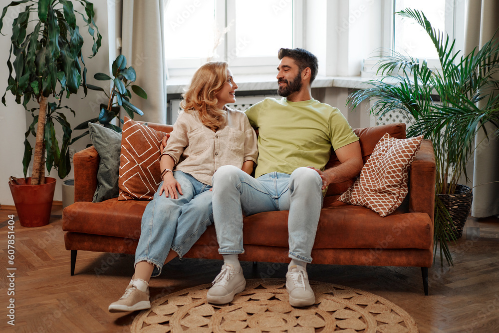 Obraz premium Couple with dog at home