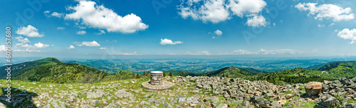 Panorama from the orientation table on top of Cret de l'Oeillon mountain in Pilat, beautiful blue sky with scattered clouds, France