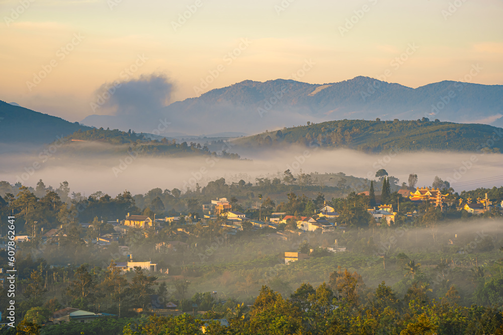 Mountains during dawn. Beautiful natural landscape in the summer time with fog