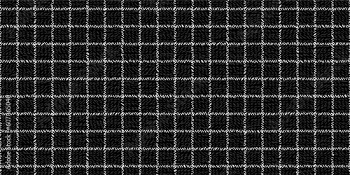 Windowpane plaid black and white seamless pattern with narrow sketchy lines and texture. Classic wool suit fabric. Elegant masculine design. Simple background. Twill variegated woolen material
