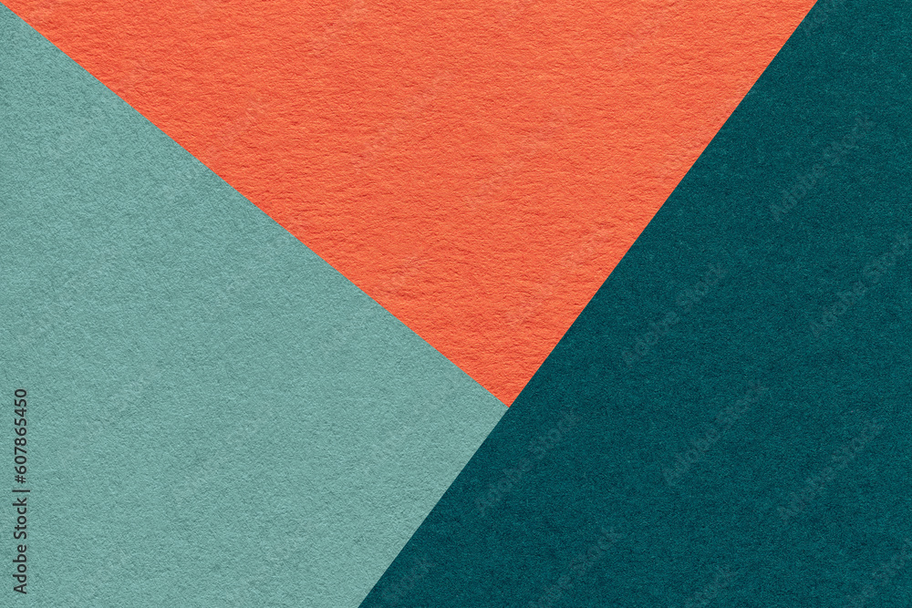 Texture of craft cyan, teal and orange shade color paper background, macro. Structure of vintage abstract cardboard Texture of craft cyan, teal and orange shade color paper background, macro. Structure of vintage abstract cardboard