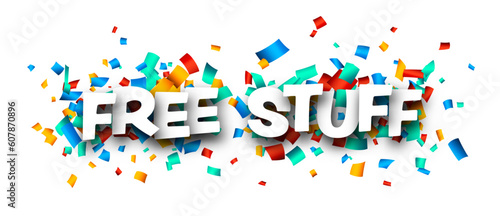 Free stuff sign over colorful cut out ribbon confetti background. Design element. Vector illustration.
